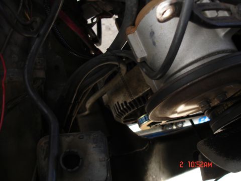 1979 Ford Bronco - Close-up view of engine components including an alternator and belts, with a timestamp visible in the lower right corner.