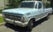 1969 Ford F-250 - A light blue Ford pickup truck is parked on a sunny day, showing its front and side profile.