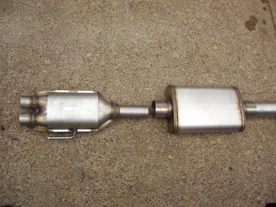 Magnaflow muffler and catalytic converter assembly on concrete
