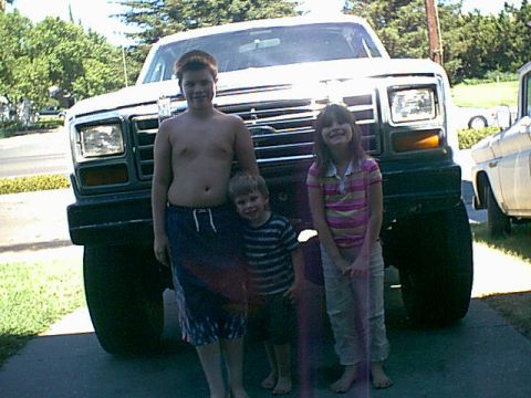 1983 Ford Bronco - Here is the front with the kids when we towed Jezebel home.