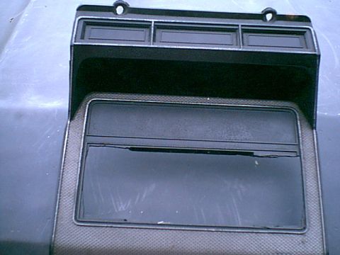 1983 Ford Bronco - Here is the stock bezel. i am not too worried about chopping it up as you can see the PO did to install a radio. this is the front. I will…