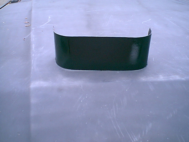 To hide or trim out the guages i took a piecs of sheet metal and bent and cut it to fit the pod. i revited it to the mount.
