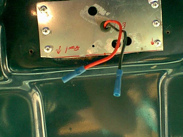Here are the wires and new mount riveted to the roof.