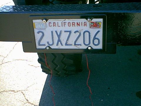 1983 Ford Bronco - I then put the nuts and washers on the LED. you can see the LED wires hanging in the back of the bumper.