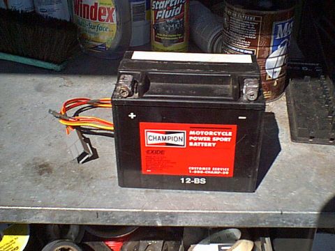1983 Ford Bronco - I had this motorcycle battery sitting on the work bench. it is nice and light to crawl in the back of the bronco to test window motors or d…