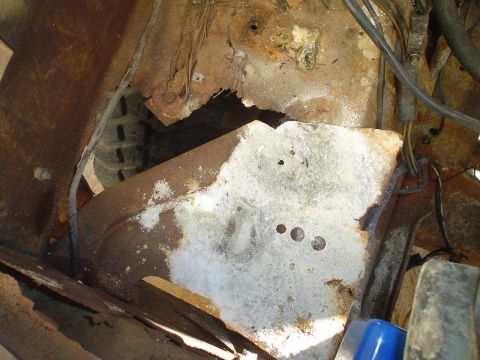 1967 Ford F-250 - The vehicle's frame shows significant rust and damage, obscuring any specific year or model details.
