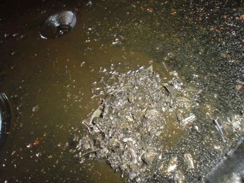 1967 Ford F-250 - Metal shavings accumulated in oil, indicating a potential failure within the rear axle assembly.