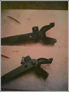 1979 Ford Bronco - A metal component shown from two angles, with the SuperMotors logo at the bottom.