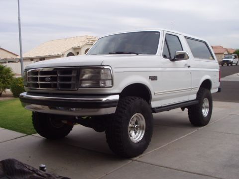 1993 Ford Bronco - This 1993 Ford Bronco is equipped with oversized tires, suggesting it is ready for off-road adventures.