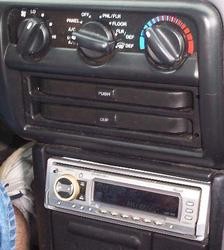 2006 Ford E350 - Taurus cupholder in a Contour. Fits in a DIN opening.