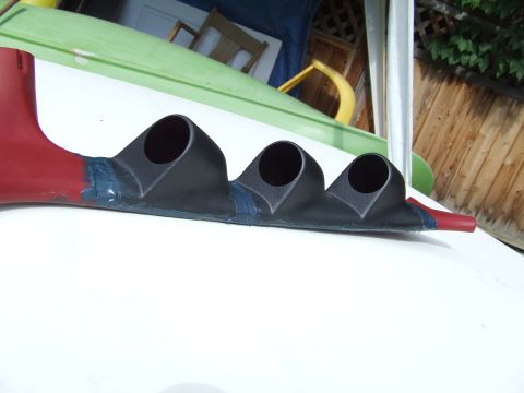 1990 Ford Bronco - Custom gauge pod with three openings, likely for aftermarket gauges, with a red and black finish.