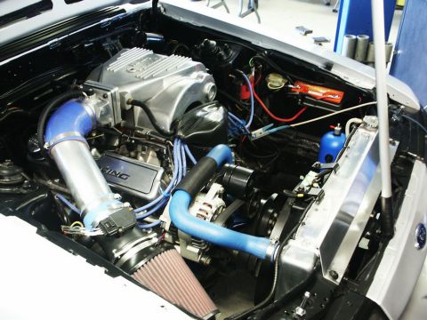 2001 Mercury Grand Marquis - Custom engine bay modifications visible, including a large air intake and aluminum components.