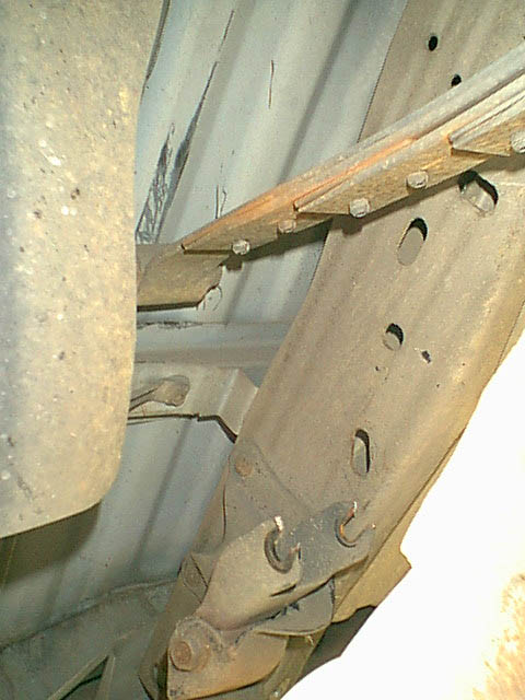 1983 Ford Bronco - the hit tore the shackle and bent the leaf spring and this is the back end of the spring.