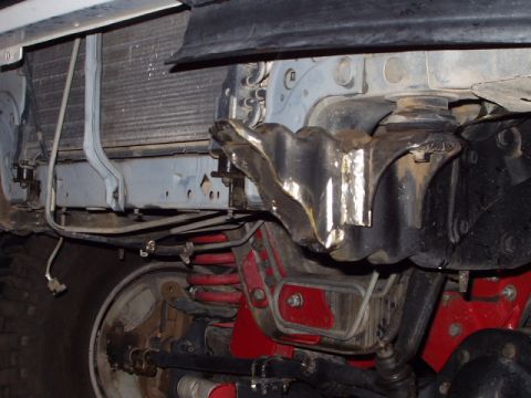 1993 Ford Bronco - Close-up of the front prerunner bumper and radiator assembly on a 1993 Ford Bronco.