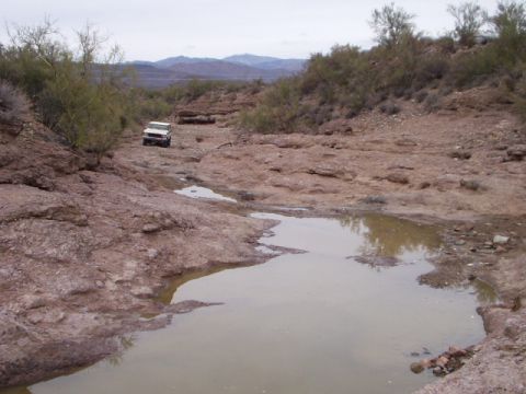 1993 Ford Bronco - recent rain has added a little fun to the trail with swamps to drive through