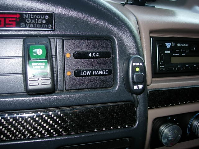 Dashboard with 4x4 and low range buttons, driving lights switch, PIAA on/off switch, and Kenwood stereo