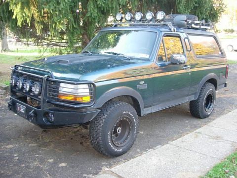 1993 Ford Bronco - This 1993 Ford Bronco is equipped with a bull bar, roof rack, and off-road tires.