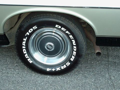 1973 Ford Ranchero - the previous owner installed radial tires on the orignal steel wheels; these are the original hubcaps