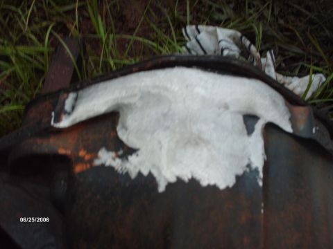 1982 Ford F-100 - A differential housing is shown with white sealant applied. The image also includes a date stamp of 06/25/2006.