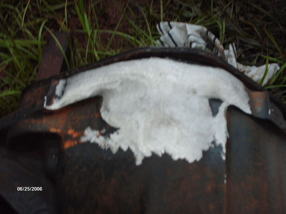 Differential housing with white sealant and date stamp 06/25/2006