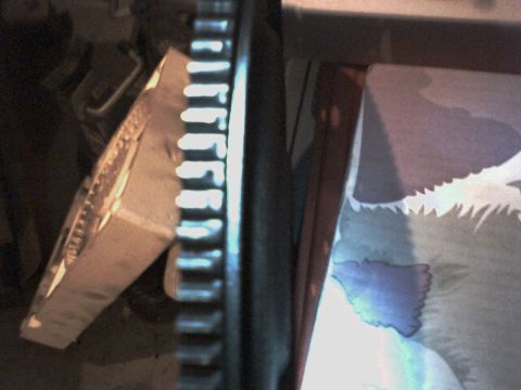 1983 Ford Bronco - Close-up view of a toothed metal component, likely a part from a vehicle's drivetrain.