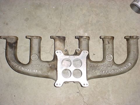 1983 Ford Bronco - This Offenhauser dual-port intake manifold features four carburetor openings and visible branding.