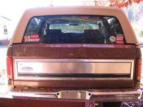 1984 Ford Bronco - This 1984 Ford Bronco displays aftermarket stickers on its rear window, including Flowmaster and MSD.