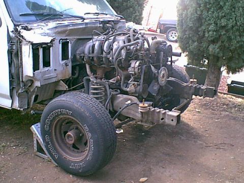 1983 Ford Bronco - now the motor is ready for a fast rinse off. the fender is off too now