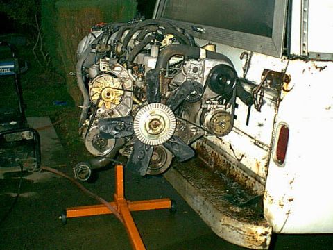 1983 Ford Bronco - the front of the motor looks better now too. i still think it needs another good soap up too.