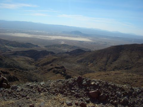 1985 Ford Bronco - View of a vast desert landscape with rolling hills and distant mountains.