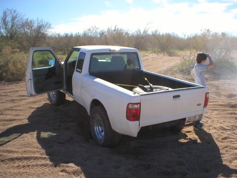 1993 Ford Bronco - brian cant drive in sand to well, had to jump in and drive it out for him...lol
