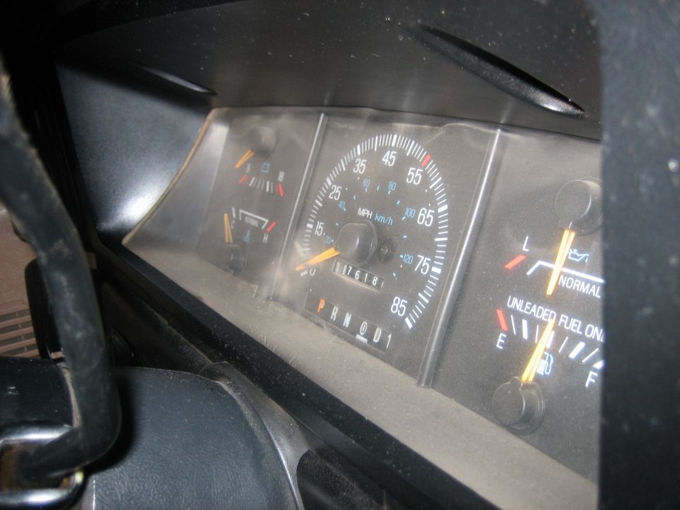 1990 Ford Bronco dashboard gauges showing speedometer, fuel, and temperature