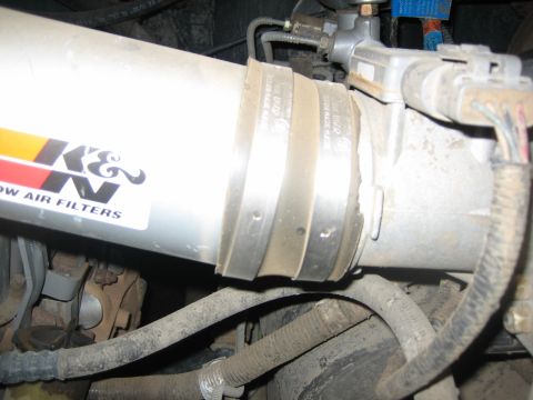 1995 Ford Bronco - Engine intake system with K&N air filter tubing and associated components.