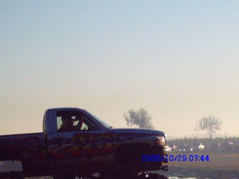 1987 Suzuki Samurai - Pickup truck with custom graphics and a date stamp of 2006/10/29.