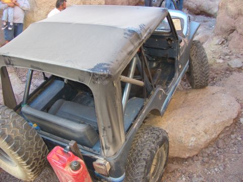 1985 Ford Bronco - This modified Jeep CJ-7 is equipped for off-road adventures, a roll cage and a spare gas can.