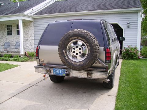 2000 Chevrolet Tahoe - Rear view of a 2000 Chevrolet Tahoe, a spare tire on a custom rear bumper.