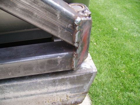 2000 Chevrolet Tahoe - A close-up view shows a heavily welded metal component, possibly a custom bumper or frame modification.