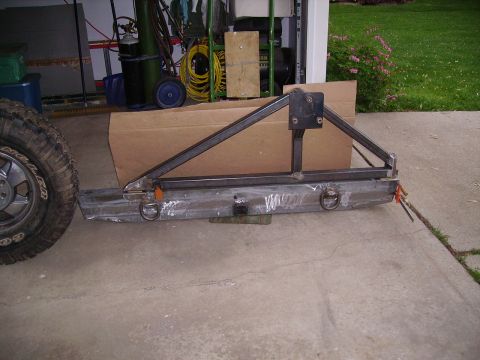2000 Chevrolet Tahoe - A custom rear bumper assembly, likely for an off-road vehicle, is shown with a tire carrier frame.