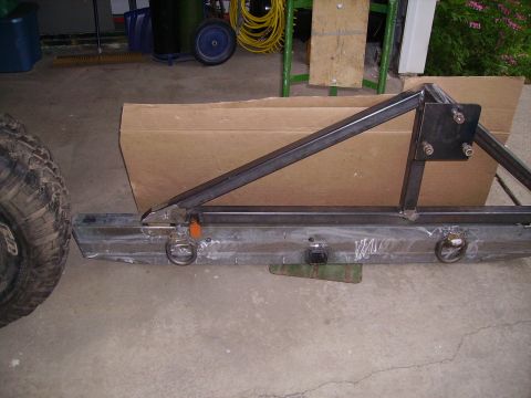 2000 Chevrolet Tahoe - A custom-fabricated rear bumper assembly, likely for an off-road vehicle, is shown with a tire carrier mount.