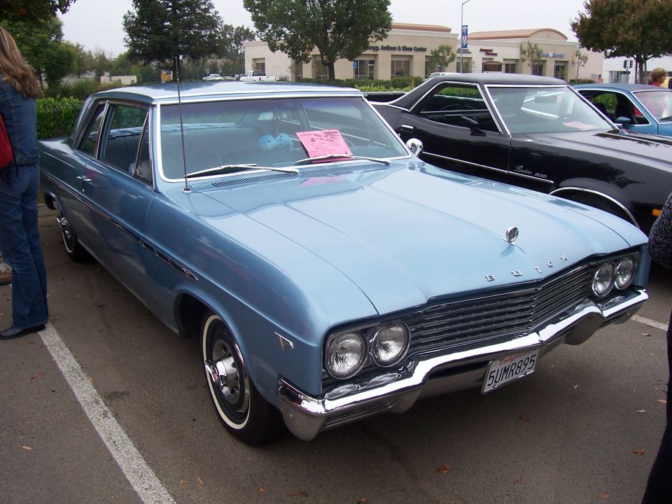 Blue 1964 Buick sedan front 3/4 view
