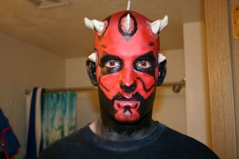 1995 Ford Probe - Person in Darth Maul costume with face paint and horns.