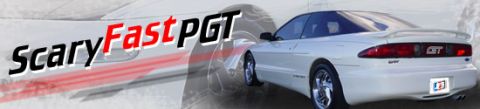 1996 Ford Probe - Rear view of a white 1996 Ford Probe GT, a prominent spoiler and GT badging.