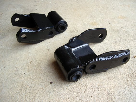 This was stolen from the web - sorry author not noted. if you like to use the stock shackle you should beef it up so it lasts. this was an easy fix. just weld larger plates on the sides and i would add a cross mount to sorta box in the shackle.
