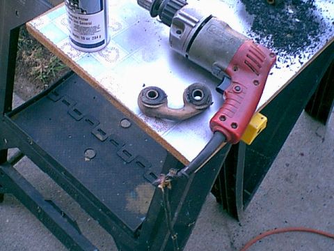 1983 Ford Bronco - i wanted to replace the worn out rubber bushings so out the dog bones came and i drilled out the old bushings.