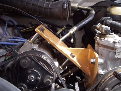 1993 Ford Bronco - using 1.5" spacers you are able to get the york high enough to clear the pump