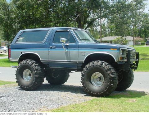 1974 Ford F-100 - This modified Ford Bronco features a two-tone paint scheme and aggressive off-road tires.