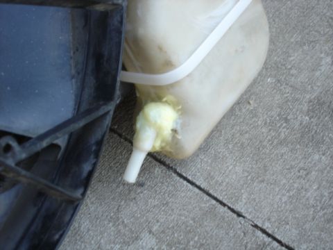 1996 Ford Bronco - This shows the lower mounting of the mustang reservior. This also shows how the reservior was changed and epoxied back together to allow it…