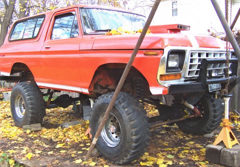 1978 Ford Bronco - This orange 1978 Ford Bronco is modified with a lifted suspension and oversized tires.