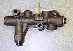 1986 Ford Bronco - A close-up view of a brake master cylinder, identified by the SuperMotors logo.