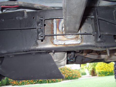 1993 Ford Bronco - driverside mounting of the slider.....fits right between the brake cables on the 93-96 trucks. older broncos may need a little triming of t…